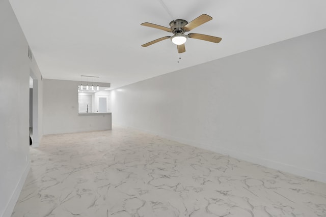 unfurnished room featuring light tile floors and ceiling fan