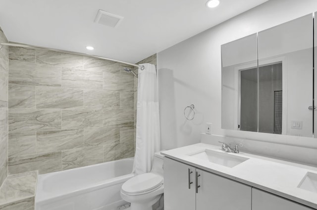 full bathroom with oversized vanity, toilet, and shower / bath combo with shower curtain