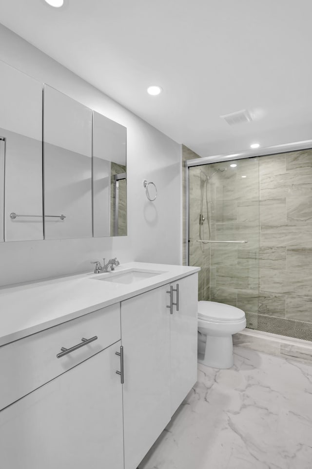 bathroom with toilet, tile flooring, walk in shower, and vanity