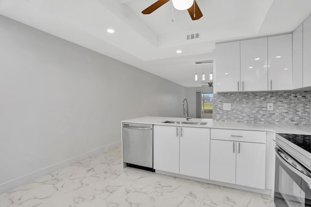 kitchen featuring white cabinetry, ceiling fan, light tile flooring, sink, and stainless steel dishwasher