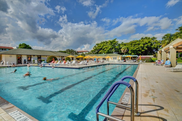 view of pool featuring a patio