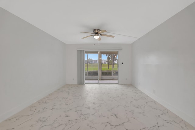 empty room with ceiling fan and light tile floors