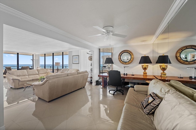 tiled living room with a water view, ornamental molding, and ceiling fan