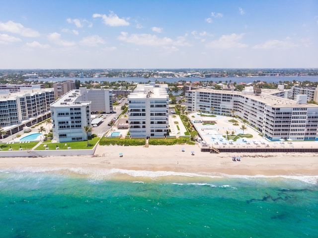 aerial view with a beach view and a water view