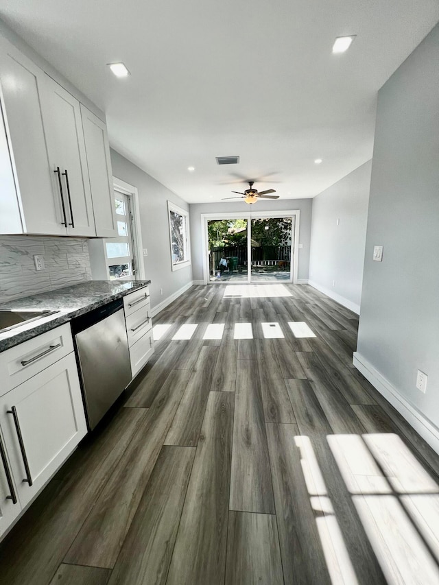 kitchen with white cabinetry, dark hardwood / wood-style floors, ceiling fan, dishwasher, and tasteful backsplash