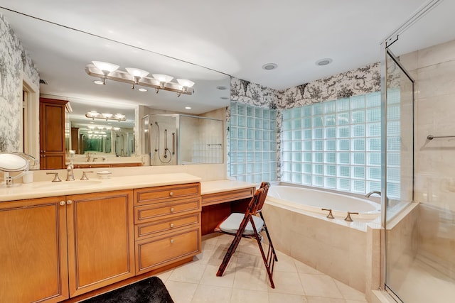 bathroom featuring vanity, independent shower and bath, and tile flooring