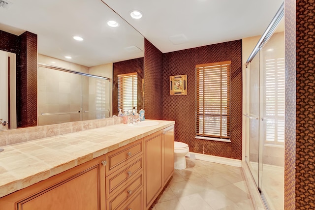 4590 Live Oak Blvd, Delray Beach, FL 33445 - bathroom with a stall shower, a wealth of natural light, and toilet