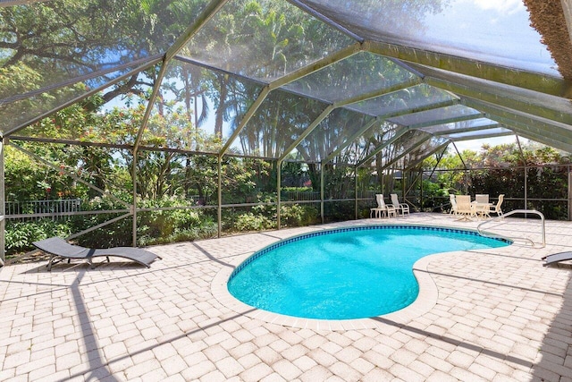4590 Live Oak Blvd, Delray Beach, FL 33445 - outdoor pool featuring a patio and a lanai