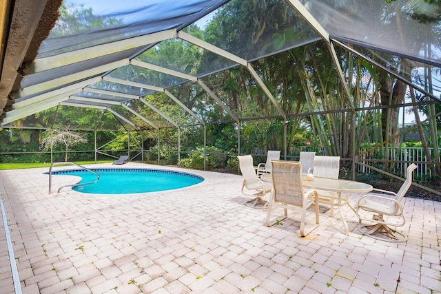 4590 Live Oak Blvd, Delray Beach, FL 33445 - outdoor pool with a patio, glass enclosure, and outdoor dining space