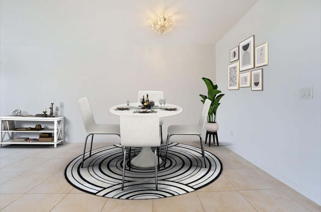 dining space with tile patterned flooring