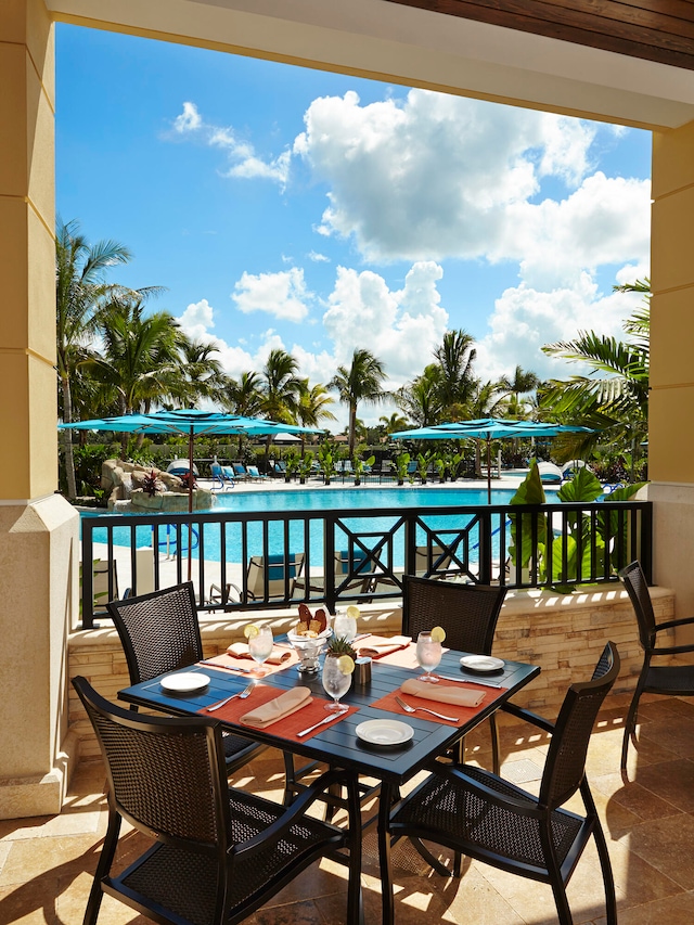 balcony with a community pool