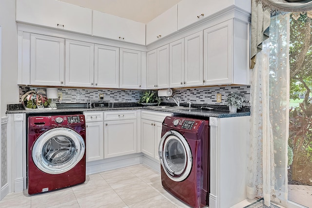 washroom with cabinets, light tile flooring, and sink