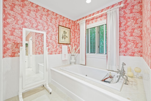 bathroom with a washtub and tile floors