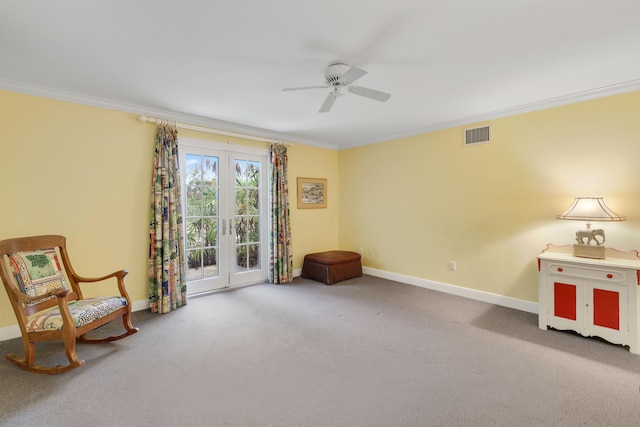 living area with french doors, light carpet, ceiling fan, and ornamental molding