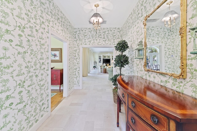 hallway featuring light tile flooring