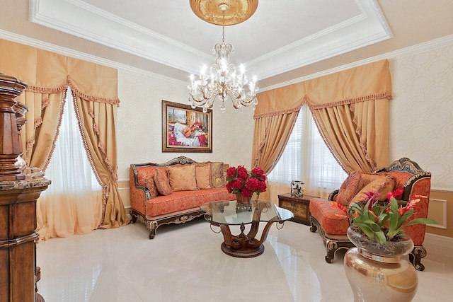 sitting room with a chandelier, crown molding, tile flooring, and a tray ceiling