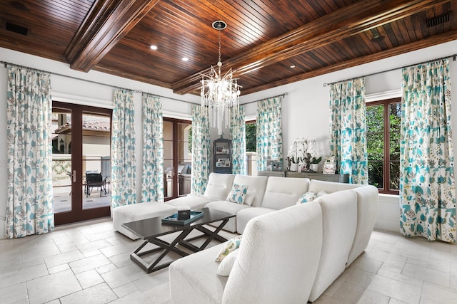 tiled living room featuring beamed ceiling, french doors, wood ceiling, and an inviting chandelier