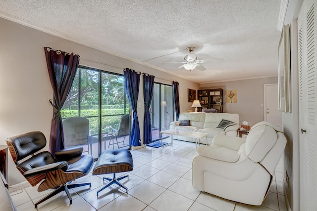 living room featuring light tile patterned floors, a textured ceiling, ceiling fan, and crown molding