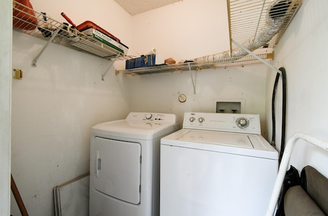 laundry room featuring washer and dryer