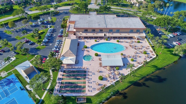 birds eye view of property featuring a water view