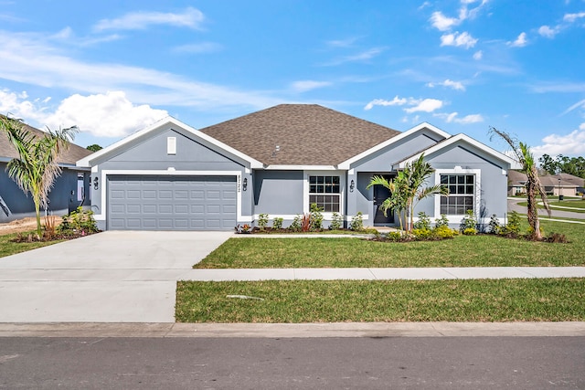 ranch-style home featuring a front yard and a garage