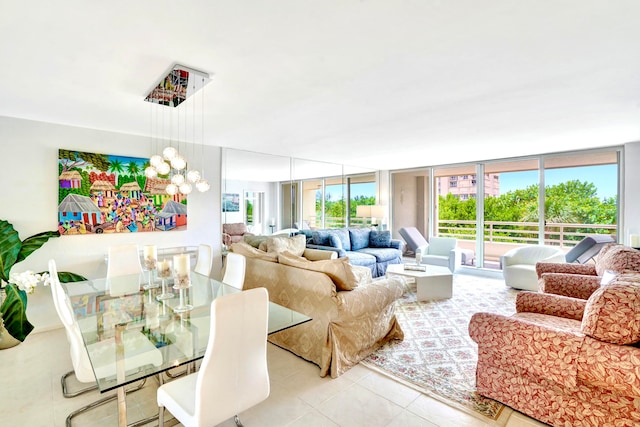 living room featuring light tile patterned floors and expansive windows