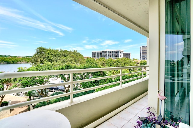 balcony featuring a water view