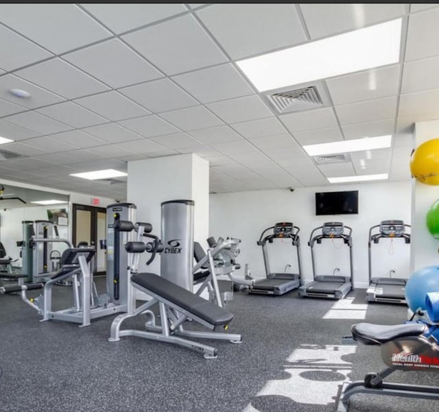 gym with a drop ceiling