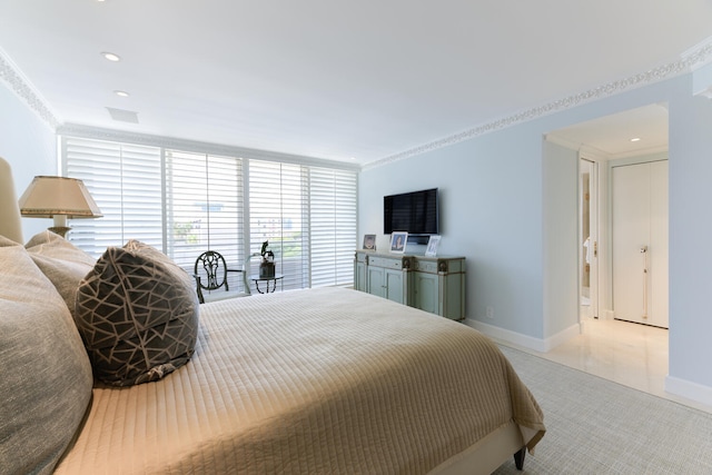 bedroom with crown molding