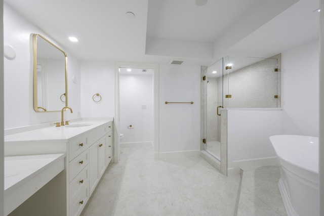 full bathroom featuring vanity, toilet, tile patterned floors, and plus walk in shower