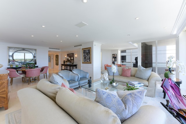 living room featuring crown molding