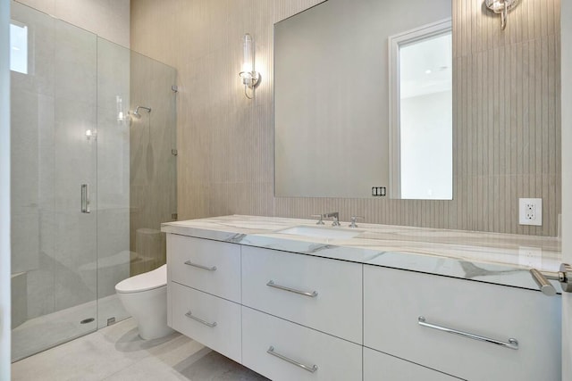 bathroom with walk in shower, vanity, tile walls, tile patterned flooring, and toilet