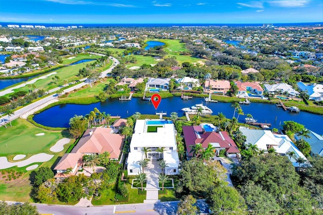 birds eye view of property featuring a water view