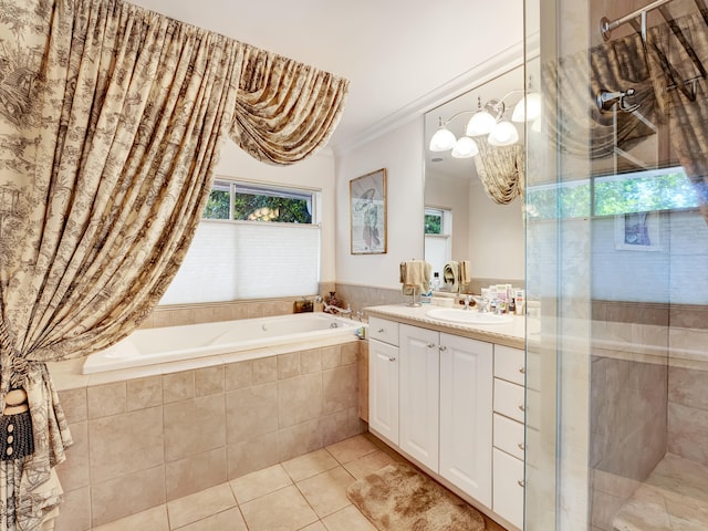 bathroom with vanity with extensive cabinet space, plus walk in shower, tile floors, and crown molding