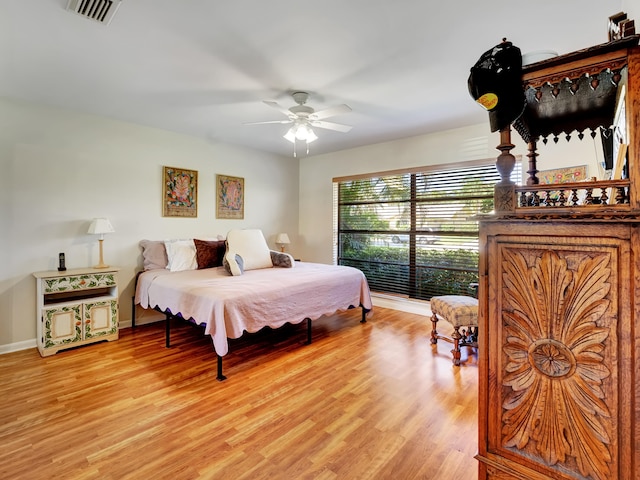 bedroom featuring ceiling fan and light wood-type flooring