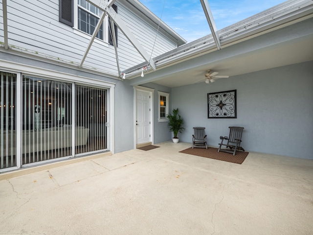 view of patio / terrace featuring ceiling fan