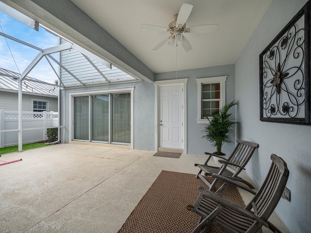 view of patio with a lanai and ceiling fan