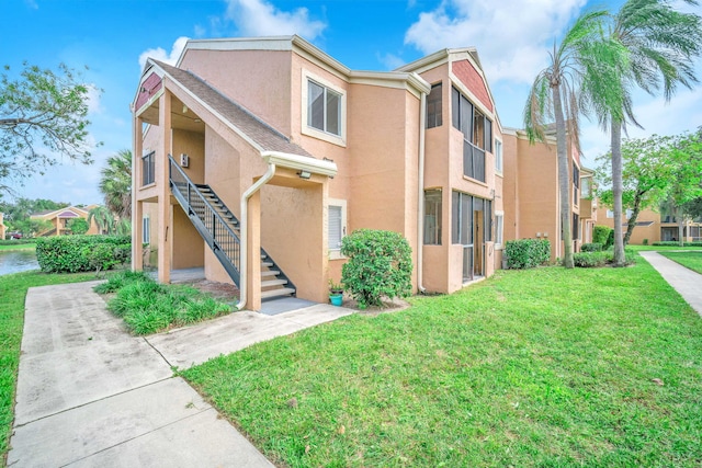 view of front of house with a front yard