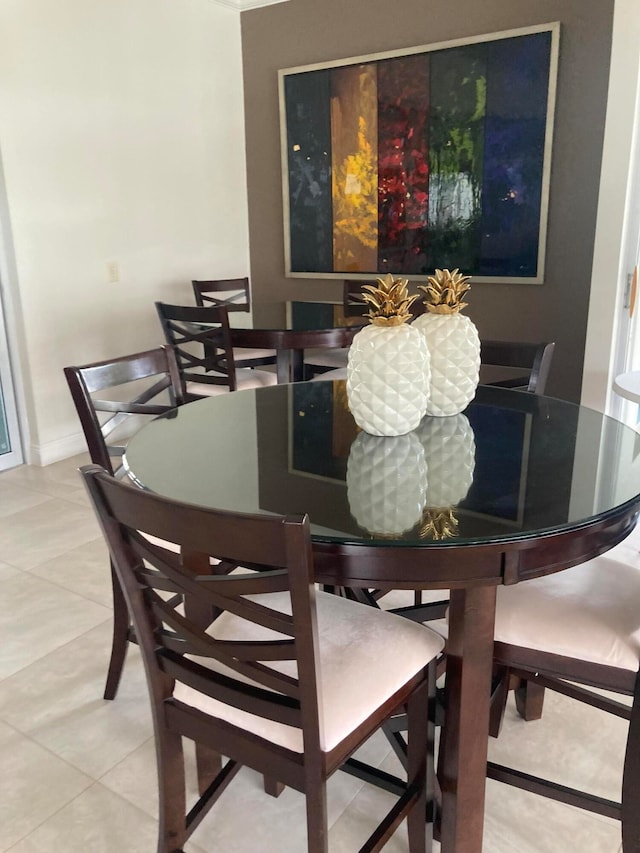 dining room with tile patterned flooring