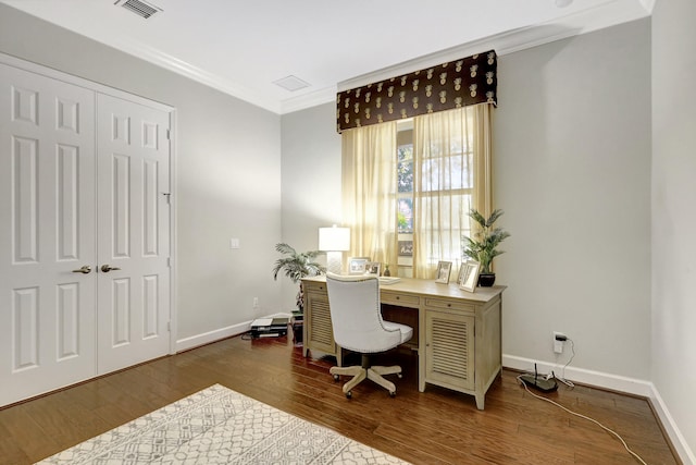 office with ornamental molding and dark wood-type flooring