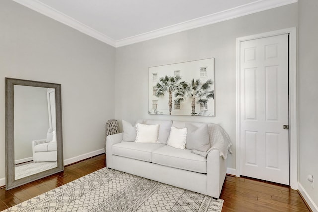 living room with dark hardwood / wood-style floors and ornamental molding