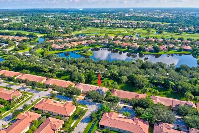 drone / aerial view with a water view