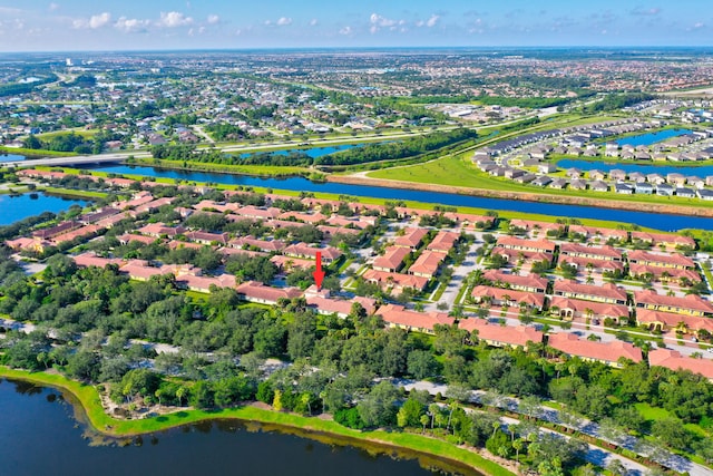 bird's eye view with a water view