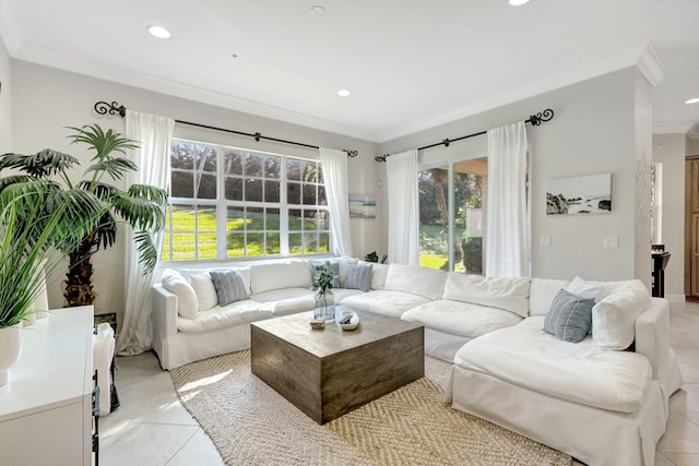 living room featuring ornamental molding and light tile floors