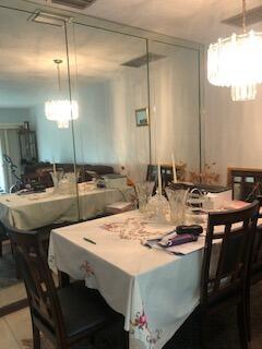 dining space with a chandelier