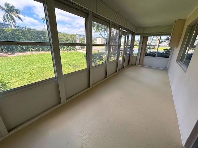 unfurnished sunroom with a healthy amount of sunlight