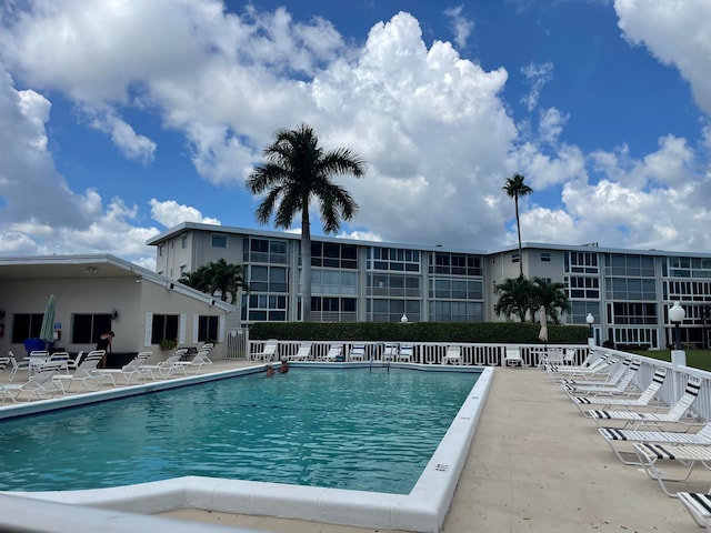 view of swimming pool featuring a patio area