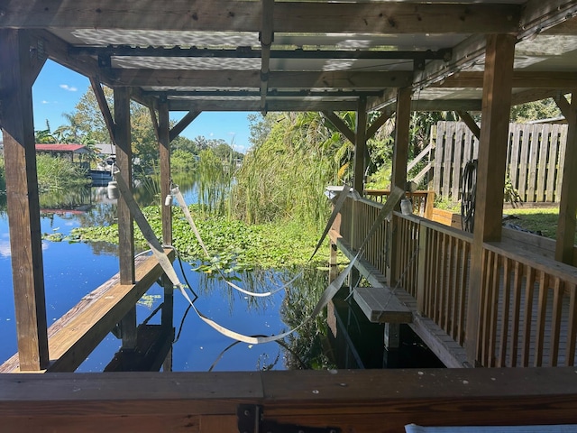 dock area featuring a water view