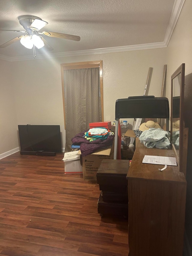 bedroom with crown molding, a textured ceiling, ceiling fan, and dark wood-type flooring