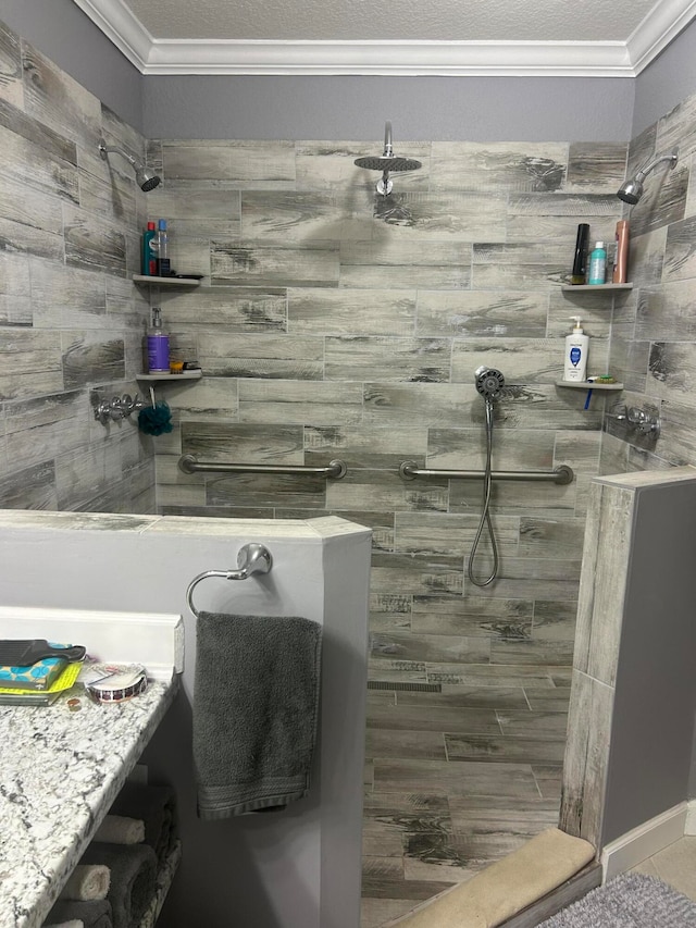 bathroom featuring a tile shower, tile flooring, and crown molding